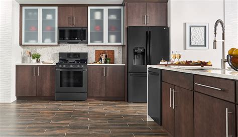 cabinet colors with black stainless steel appliances|brown kitchen cabinets black appliances.